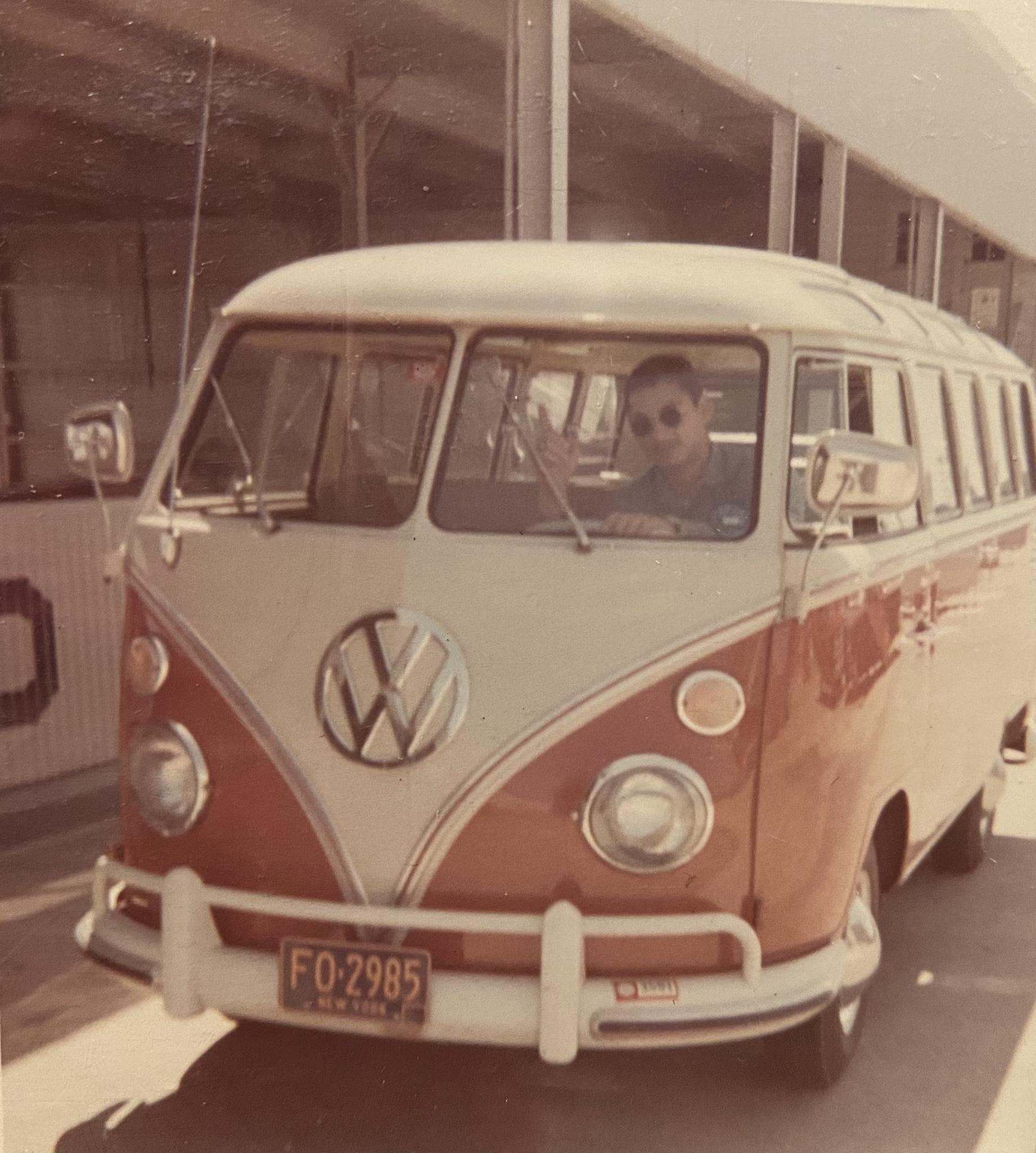 Randolph Nicholas behind the wheel of a Volkswagen bus